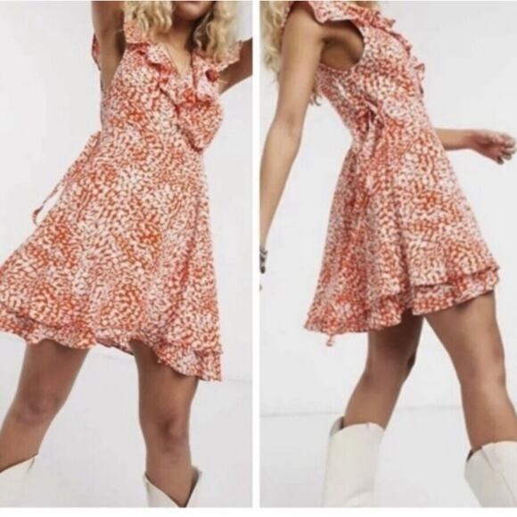 Free People Dresses & Skirts - FREE PEOPLE French Quarter Orange Ruffle Print Mini Wrap Dress. Size XS.